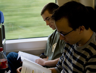 reading bookkeeping course on train